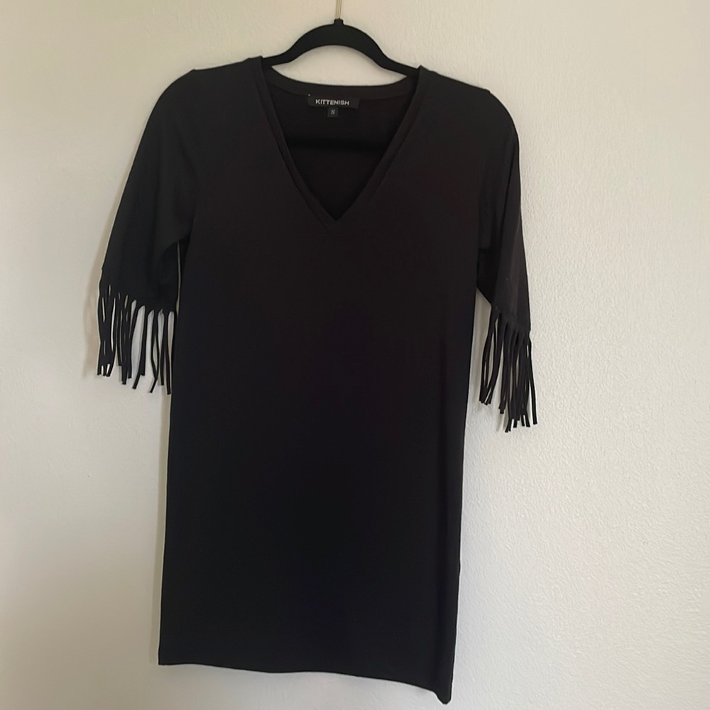 small black kittenish dress with fun sleeves